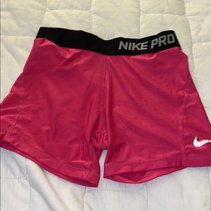 pink w black band nike pros